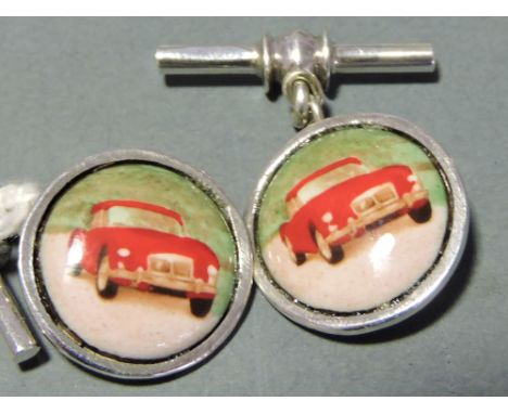 A pair of silver chain and bar cufflinks decorated with vintage cars.