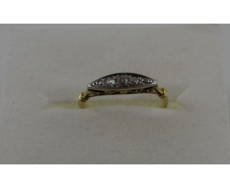 A graduated diamond five stone ring elliptical channel set in an 18ct band.