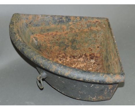 A cast iron quadrant trough, with a rolled edge and hitching point, W. 53cm.