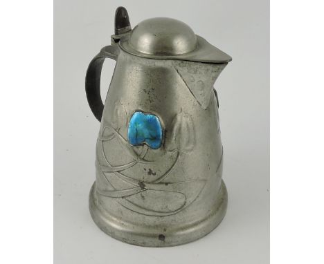 Liberty & Co. Turdric hot water jug, after Archibald Knox, the stylised foliate design with turquoise enamel flower heads, H.