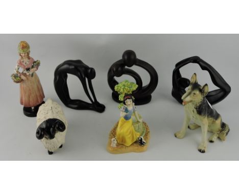 A Royal Doulton Disney figure of Snow White, SW22, H.14cm, together with six other ceramic and resin figures (7)