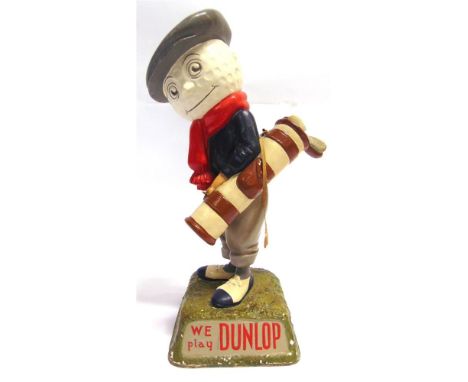 A DUNLOP GOLF BALLS SHOP DISPLAY MODEL  in the form of a painted rubber composition standing golfer, with a Dunlop 6 golf bal