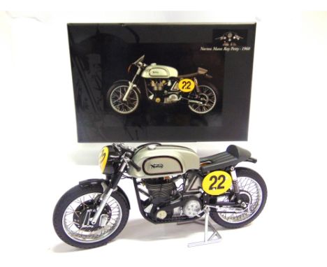 A 1/12 SCALE MINICHAMPS CLASSIC BIKE SERIES NO.26 (ITEM 122 132400), 1960 NORTON MANX, RAY PETTY  silver, racing number 22, m