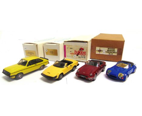 [WHITE METAL]. THREE 1/43 SCALE MODEL CARS  comprising a K. &amp; R. Replicas kit-built Ford Escort Mk 2, yellow, near mint (