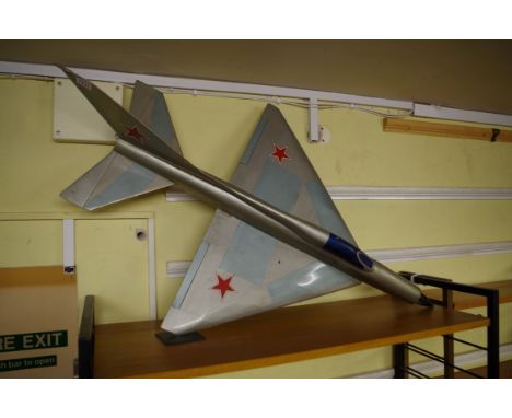 A vintage painted model of a US jet plane,&nbsp;103cm long.&nbsp; 