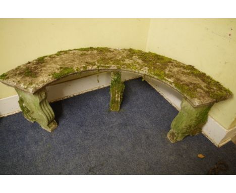 An old weathered composition stone curved garden bench,&nbsp;154cm wide.&nbsp; 