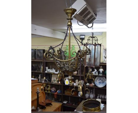 An antique brass ceiling light,&nbsp;with scroll decoration, total drop 60cm. 