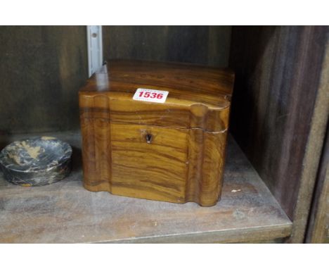 An olive wood caddy,&nbsp;15cm wide.&nbsp; 