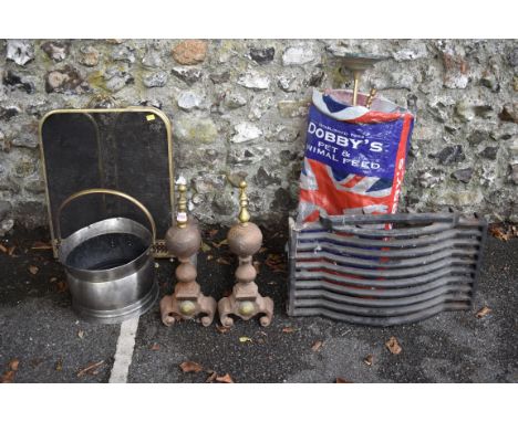 A quantity of mixed fire items; to include two fire dogs a fire grate and a bag of fire tools.&nbsp;This lot can only be coll