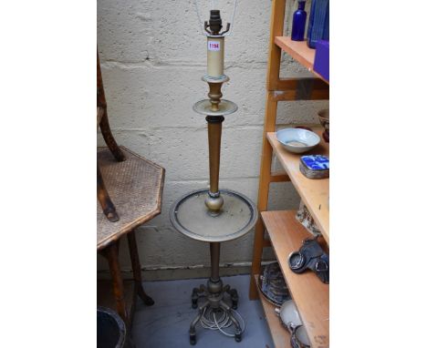 A small brass standard lamp.&nbsp; 