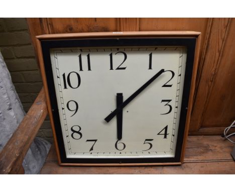 A large vintage wall timepiece,&nbsp;53cm square, (with associated battery operated movement). 