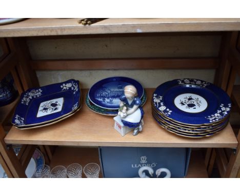 A Royal Copenhagen girl, 14.5cm high; together with a similar 1992 Christmas plate; and a Copeland Spode part dessert service