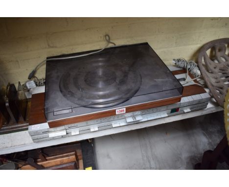 A vintage Bang &amp; Olufsen Beogram 1100 turntable;&nbsp;together with Beocenter 1500. 