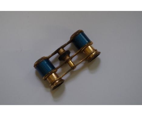 A pair of French blue guilloche enamel and gilt brass opera glasses, inscribed&nbsp;G E&nbsp;Pryor..., Paris,&nbsp;8.5cm wide