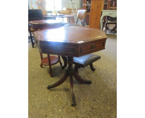 SMALL PROPORTIONED MAHOGANY OCTAGONAL LEATHER TOP DRUM TABLE ON A QUATREFOIL BASE    