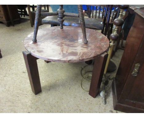 GOOD QUALITY RED MOTTLED MARBLE CIRCULAR TOP FORMED AS A COFFEE TABLE WITH FOUR PLANK LEGS    