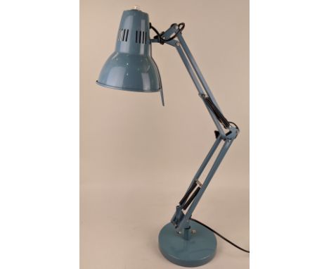 An Anglepoise style metal desk lamp in blue, with adjustable shade and arm on circular base