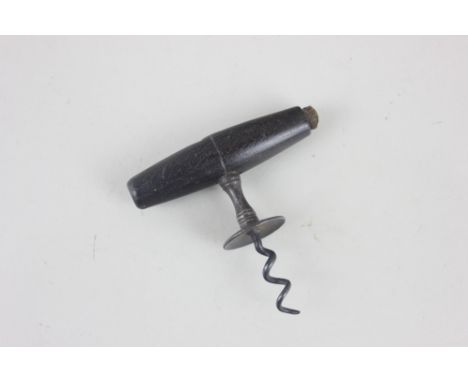A Henshall patent corkscrew with button marked Obstando Promoves Soho Patent, wooden handle with brush stump, 8.5cm