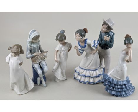 A Nao porcelain figure group of two flamenco dancers, 27.5cm high and a single flamenco dancer, 24cm high, together with two 