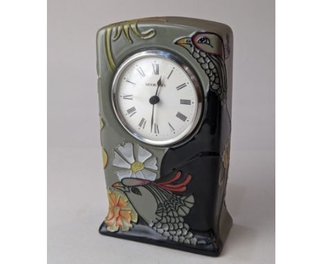 A Moorcroft pottery 'Courting Birds' clock, 16cm high, with box and paperwork