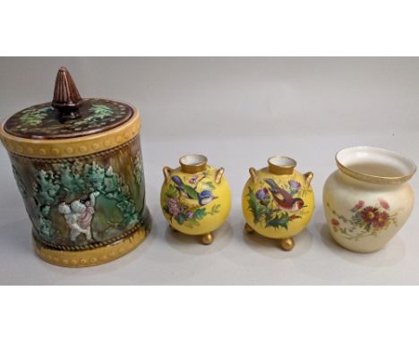 A pair of Royal Worcester porcelain globular vases, decorated with birds on flowering branches, on yellow ground, with gilt e