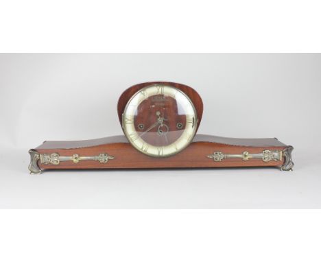 A Rolls Westminster mantle clock with wide rectangular base and brass strap and corner mounts, 66cm 