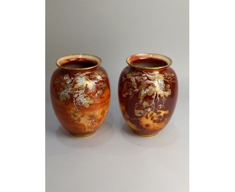 A pair of Royal Worcester Sabrina Ware vases mottled copper glaze with gilt floral decoration by WH Austin, 16cm