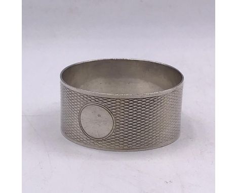 A Hallmarked silver napkin ring.