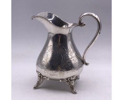 A Continental Silver Milk Jug, marked 800 (134g)