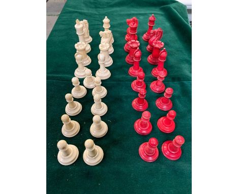 A Stanton Red and White Antique Ivory Chess set