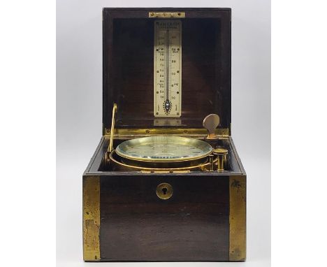 A brass bound mahogany marine chronometer, with lacquered brass gimbal mount and silvered Roman dial signed Cameron, Liverpoo
