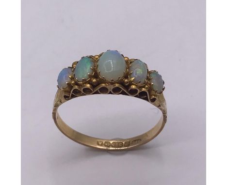 A 9ct Five stone Opal ring. Size R