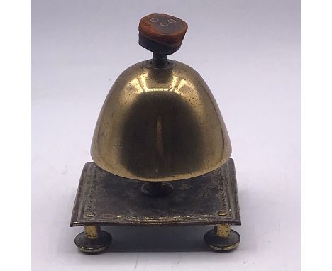 A vintage brass desk bell