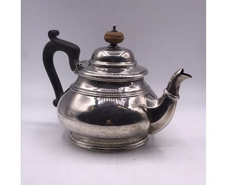 A Hallmarked silver teapot by Adie Brothers Ltd, Birmingham 1927 (Approximate weight 380g)