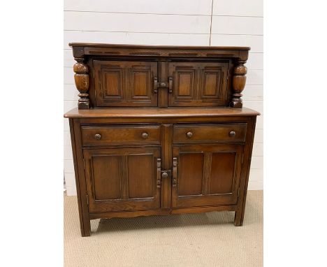 A Ercol buffet sideboard, old colonial 1960's (H125cm W117cm D47cm)