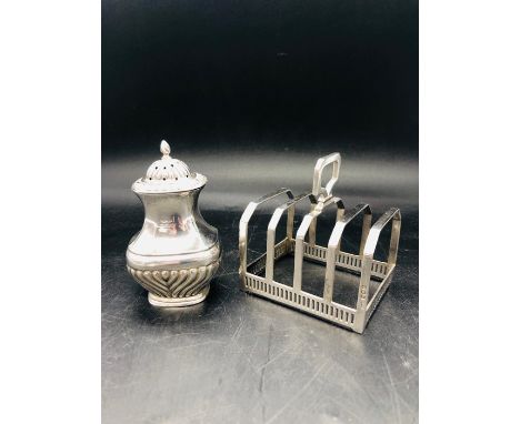 A Hallmarked silver pepper pot and a a hallmarked silver toast rack