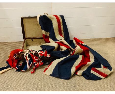 A Leather suitcase with Vintage Union Jack flag and bunting.