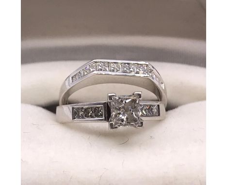A Wedding ring set of Princess cut 0.6ct engagement ring and half eternity ring on 14ct white gold