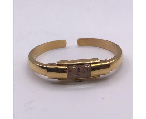 An 18ct gold Butex Bangle watch (20.8g) taking back