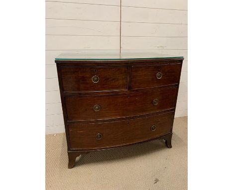 A two over two bowfront chest of drawers with brass ring pull handles (H85cm D53cm W92cm)