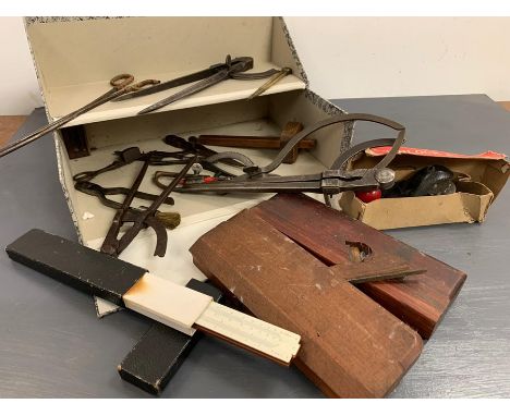 A selection of vintage carpentry tools and other items 