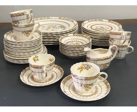 A selection of Copeland Spode Buttercup dinner ware to include twenty three plates various sizes, six cups and thirteen sauce