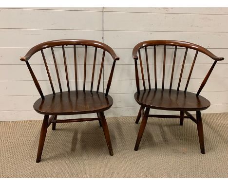 Two Ercol Cowhorn chairs 