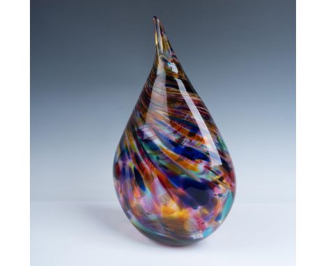 This unique handblown glass vase is modeled into a teardrop shape and features jewel-tone accents within clear glass, combini