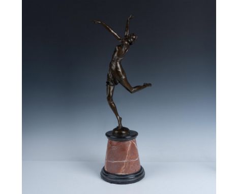 Dancer is a large original bronze by Art Deco sculptor Bruno Zach who specialized in representing tall, athletic, and dominat