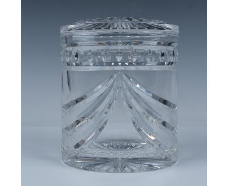 This stunning Waterford piece is handcrafted from high-quality lead crystal in a unique oval shape, featuring an elegant drap