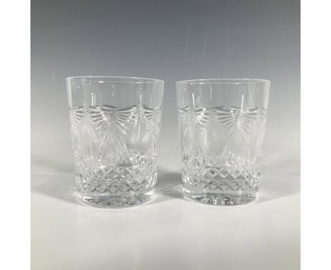 A pair of beautiful clear glasses adorned with diamond patterns and abstract angel like designs at their center. Waterford ba
