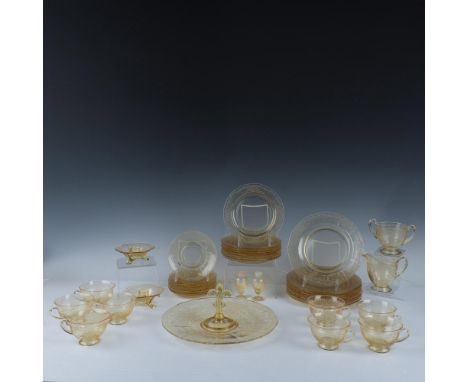 A set of 39 kitchen items, a stunning clear yellow hue and decorated with low relief ribbons and bows entwining, including 8 