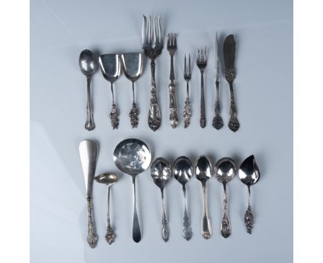 This unique collection includes a tea strainer spoon, shoehorn, tomato slicer, sugar shovel, berry spoon, butter knives, smal
