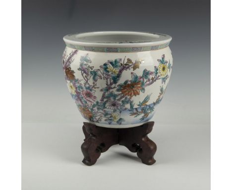 Gorgeous hand painted large floor planter that is colored with simple brush strokes and depicting many florals, herons, and s